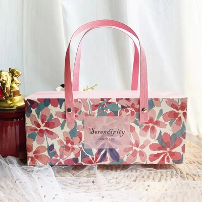 Le sac à provisions floral de papier d'emballage d'arc de ruban vêtx la boîte d'emballage de chaussures