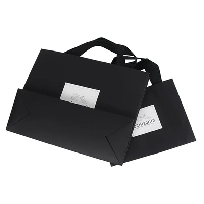 Sacs de papier de marbre de cadeau d'habillement de noir d'OEM de papier d'habillement blanc de sac